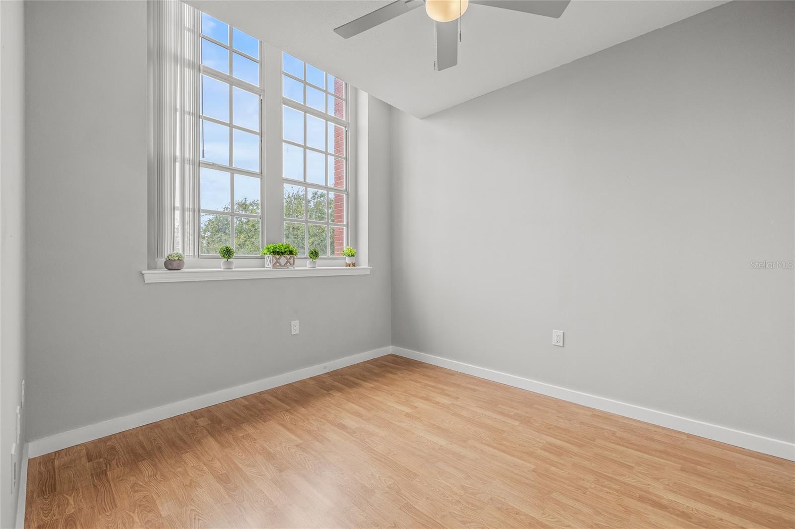 The Guest Bedroom has beautiful laminate floors