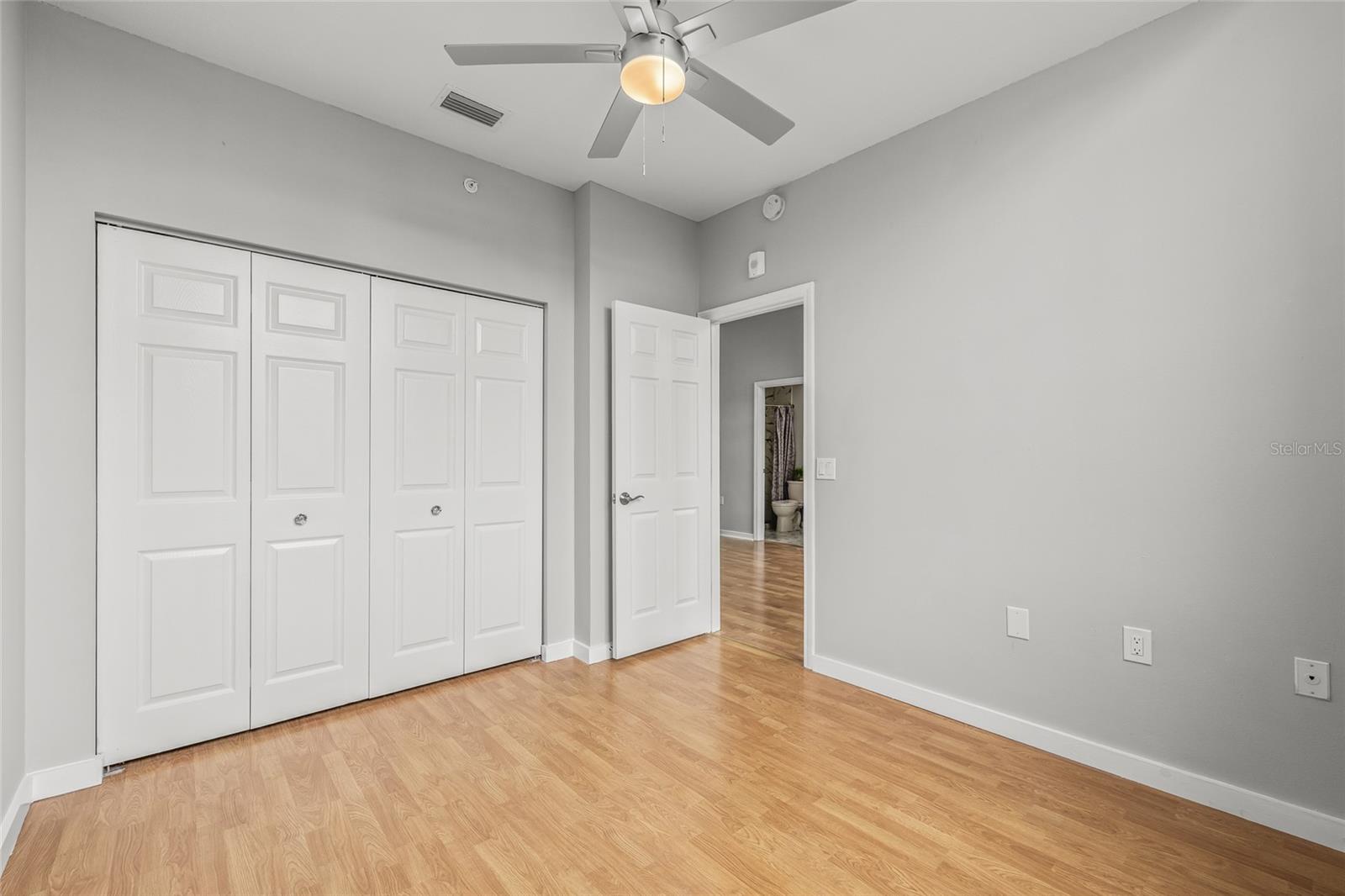 The Guest Bedroom has a beautiful new fan/light and a large closet