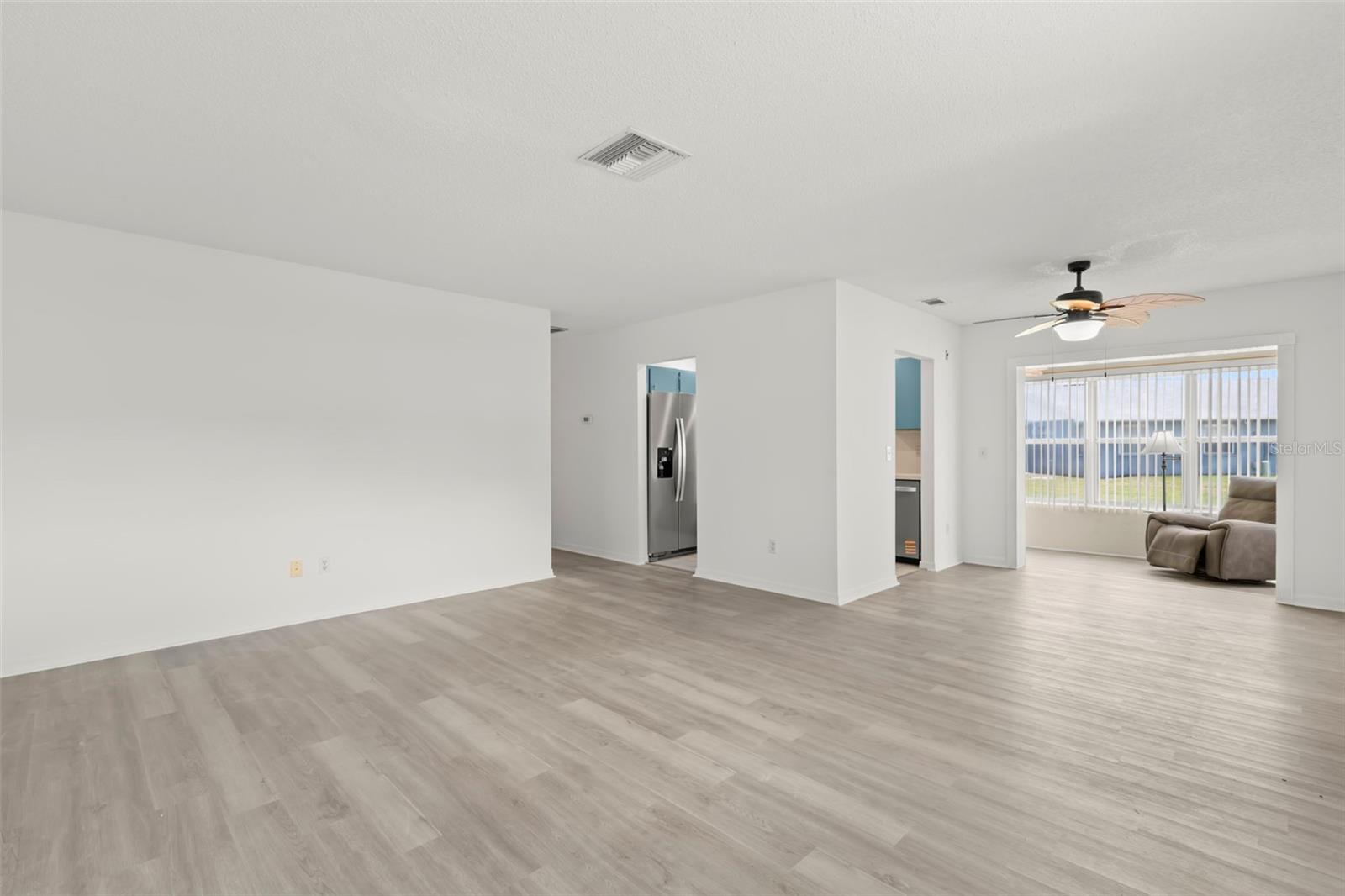 Living and Dining with view of Florida Room