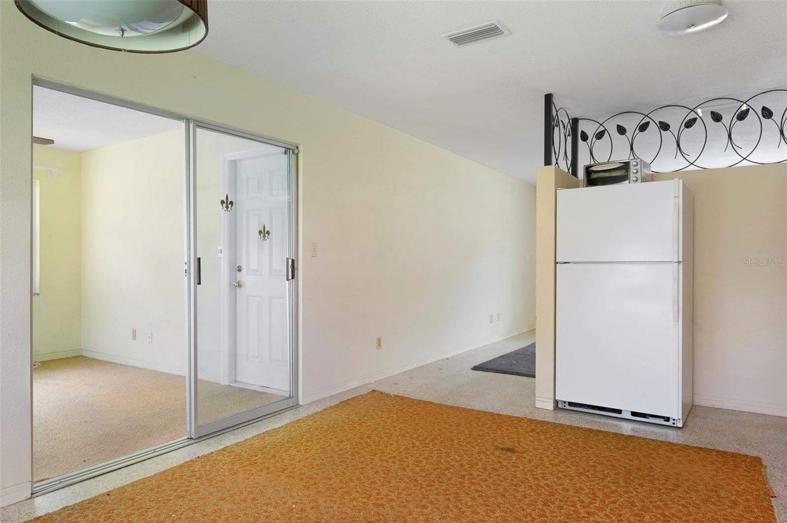 Florida room and kitchen