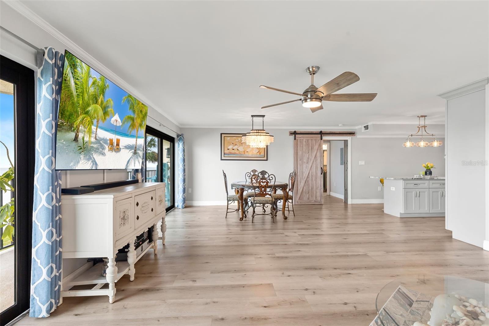 Side View of open floor plan living and dining combo