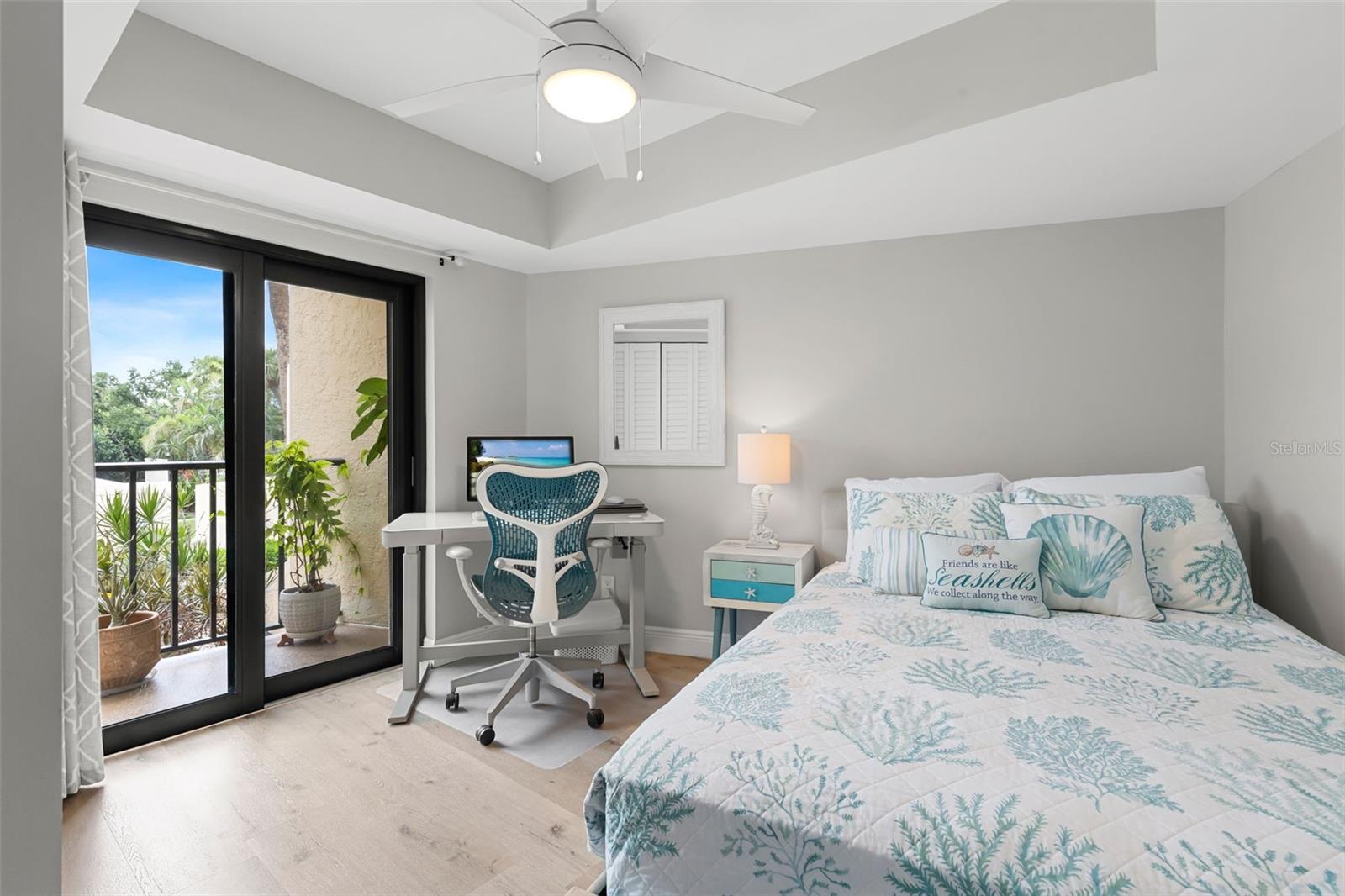 2nd Bedroom with impact sliders to balcony