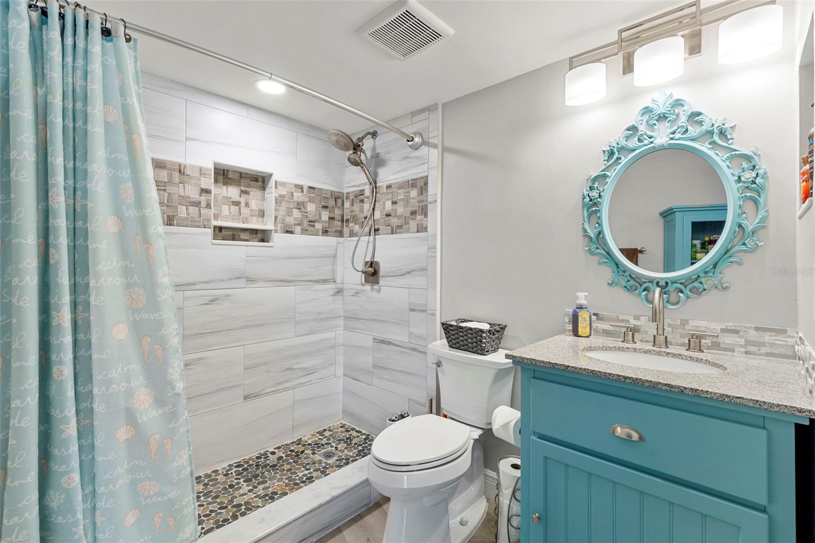 Updated 2nd Bathroom with beautiful designer tile