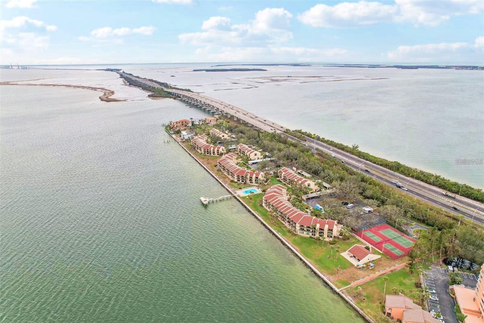 Aerial Views of Community, Pool, Fishing Dock, Clubhouse, tennis and Pickleball Courts