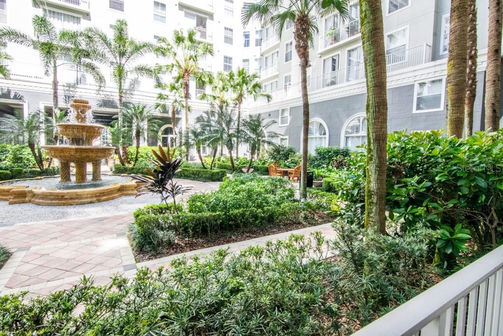 Tranquil courtyard fountains create a soothing backdrop...