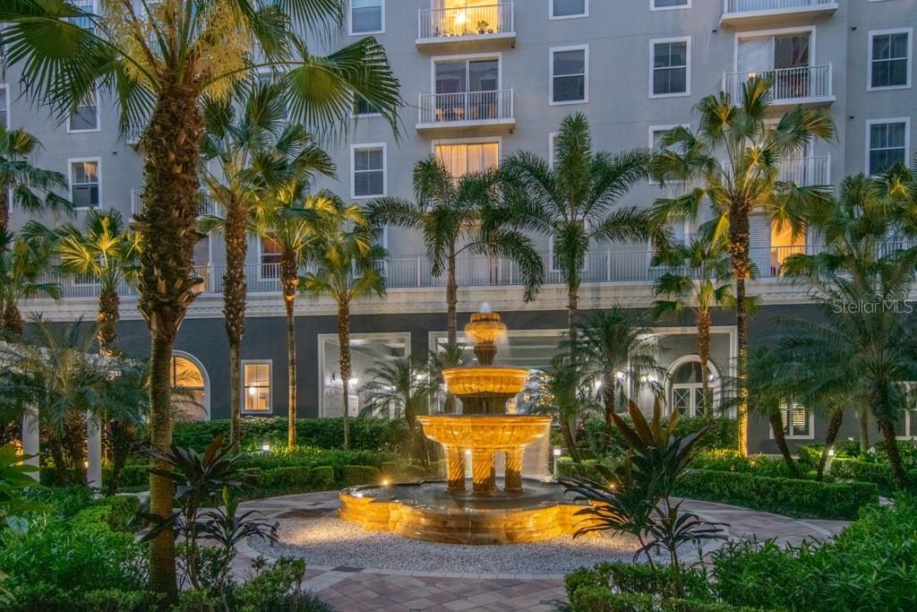 Nighttime view of beautiful courtyard fountain taken from unit.  The ambient sound from the fountain is magical.