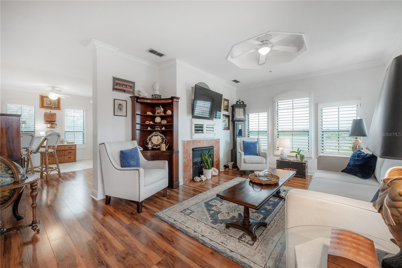 Living Room with fireplace with views of the Bay