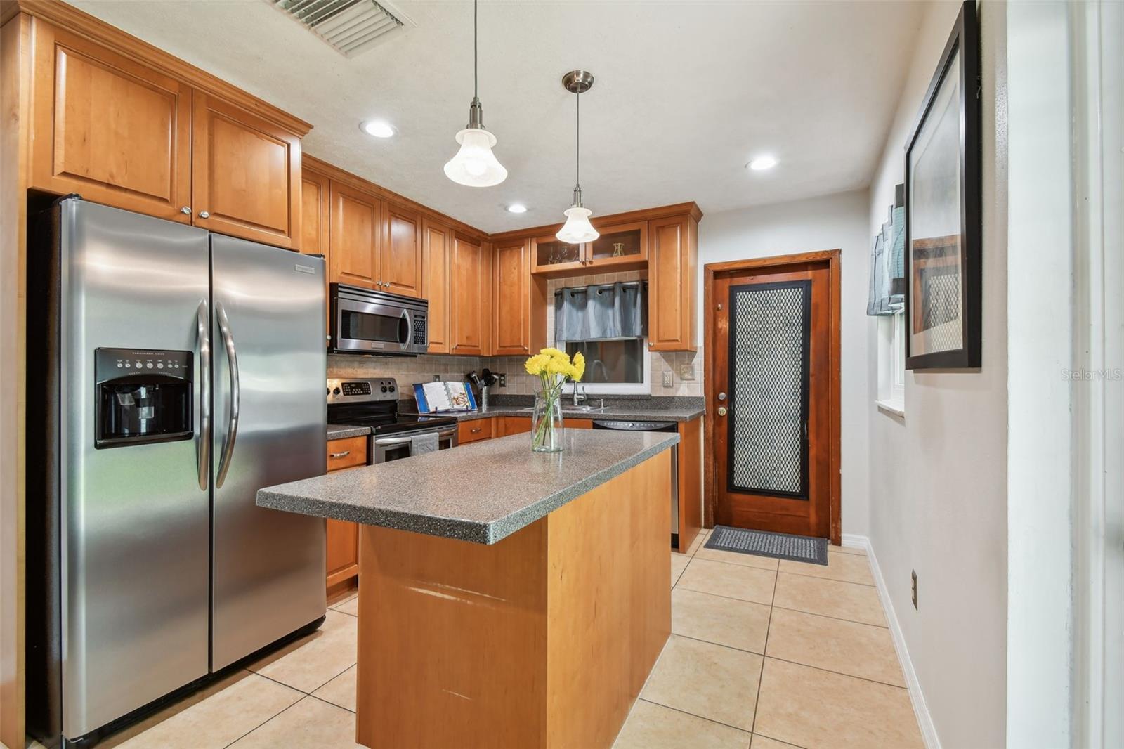 Wood Cabinets and Stainless appliances
