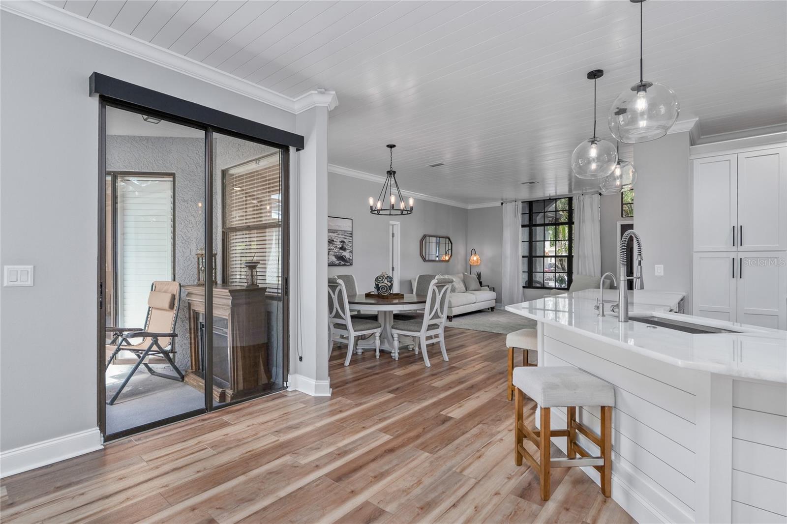 Updated lighting, Flooring and the open floorplan make this home a showstopper