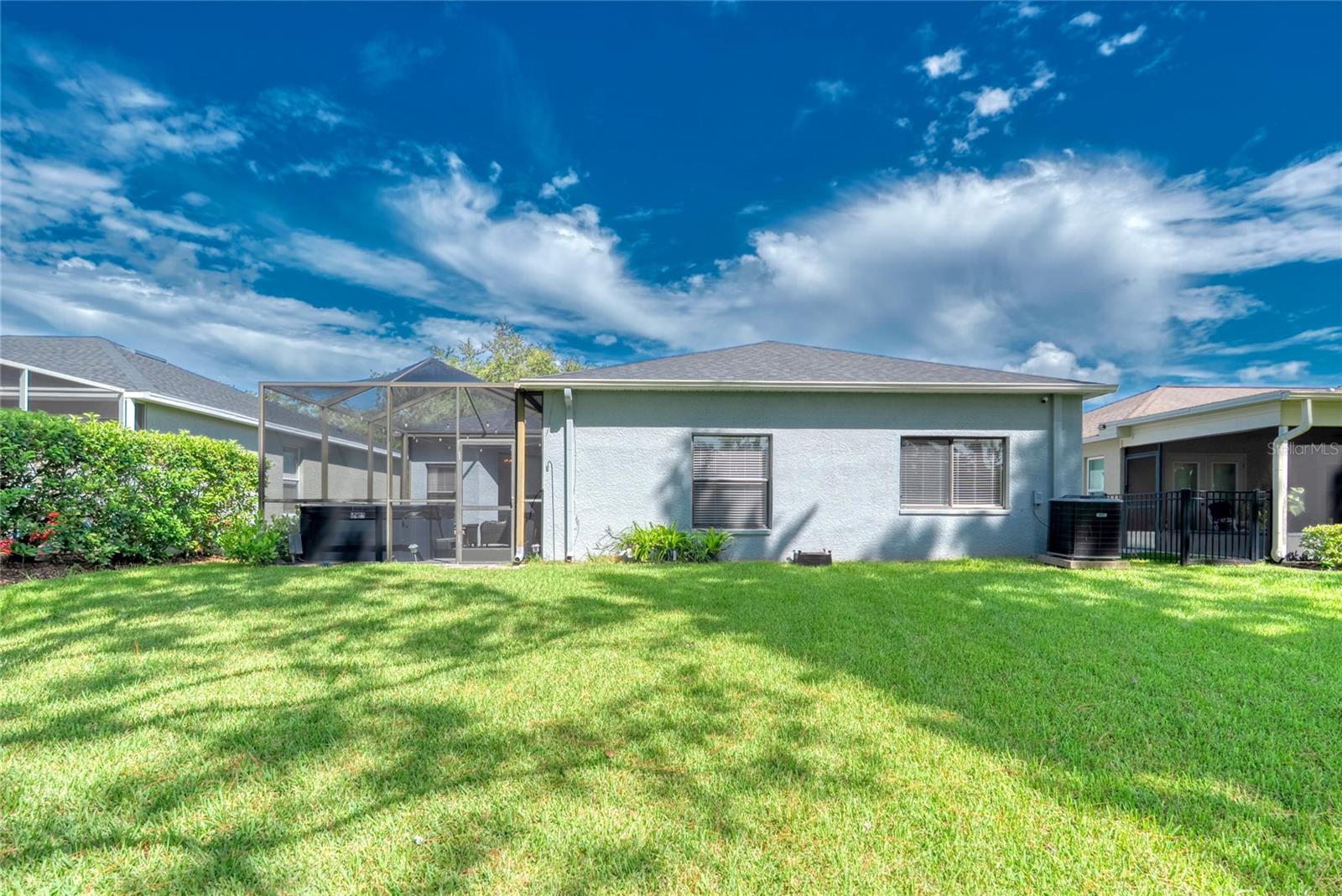 This 3 bedroom 2 bathroom home has a screened Lanai with a hot tub and no rear neighbors
