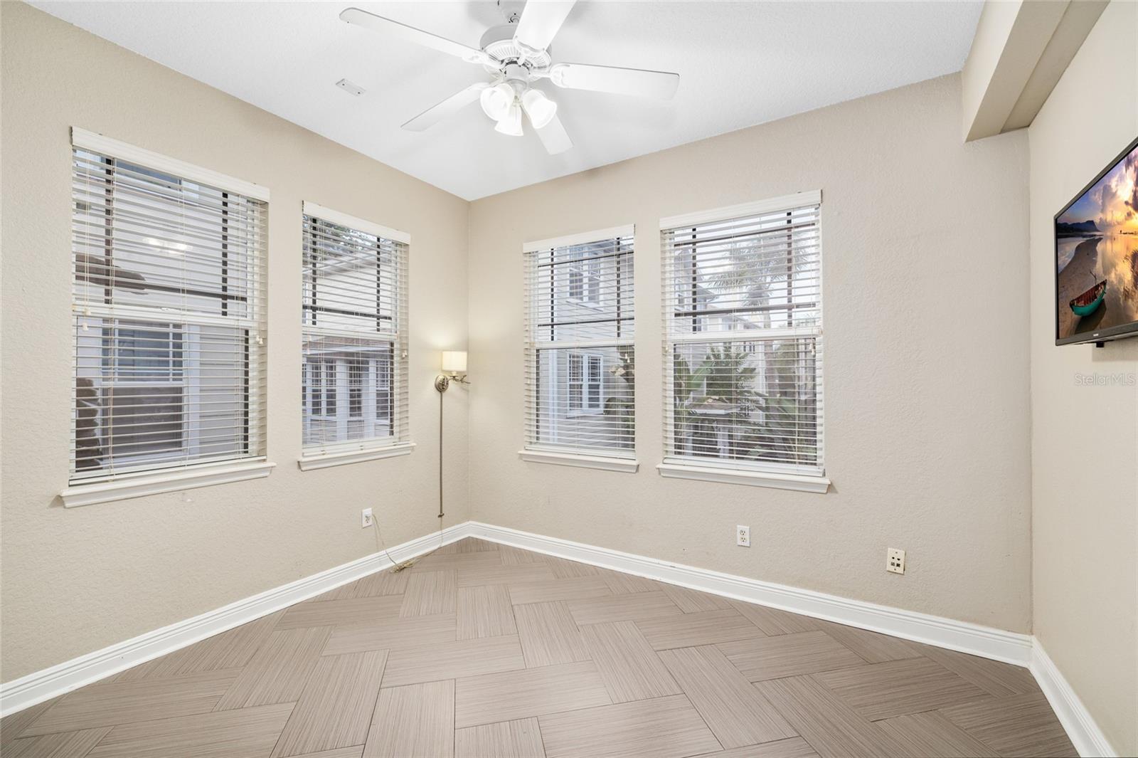 With tons of natural light, and a walk in closet, this room has many potential uses.