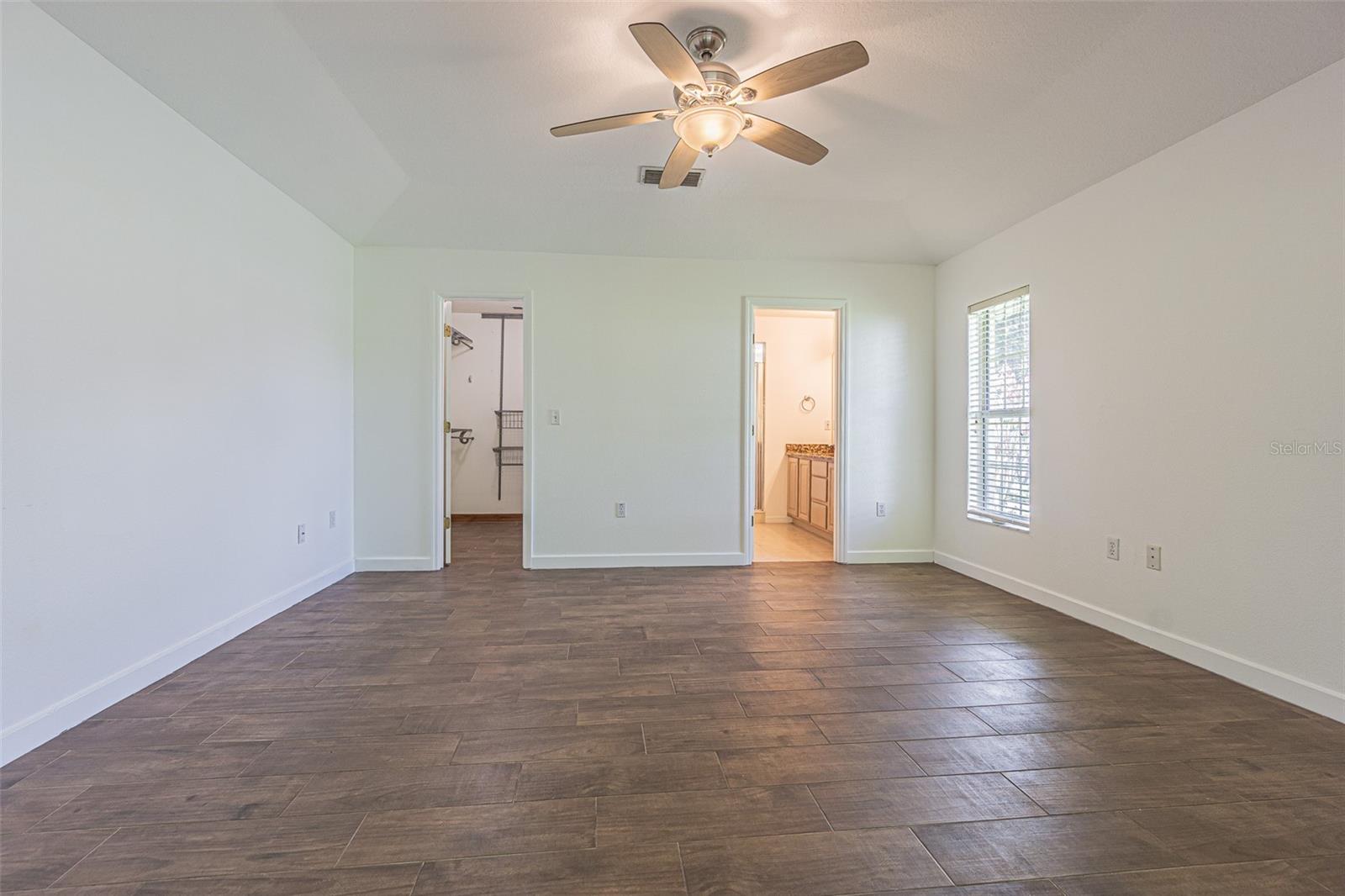 Primary bedroom with Spacious closet and bath ensuite