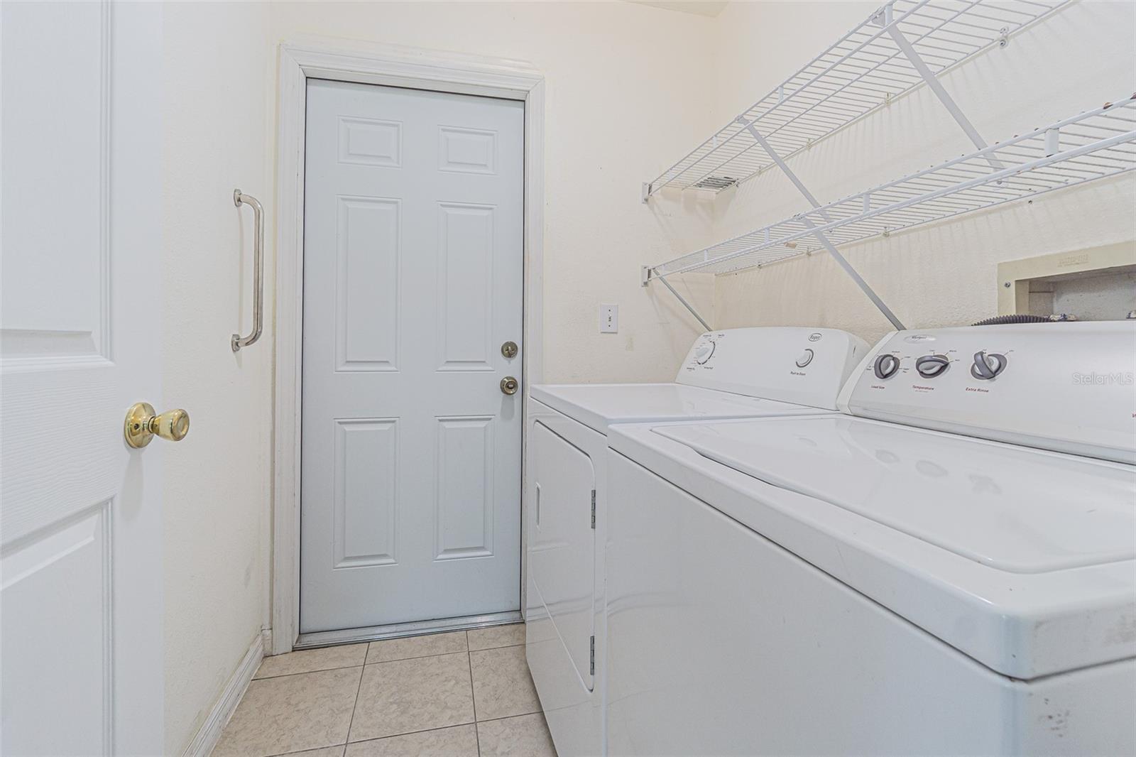 Interior Laundry room with washer and dryer