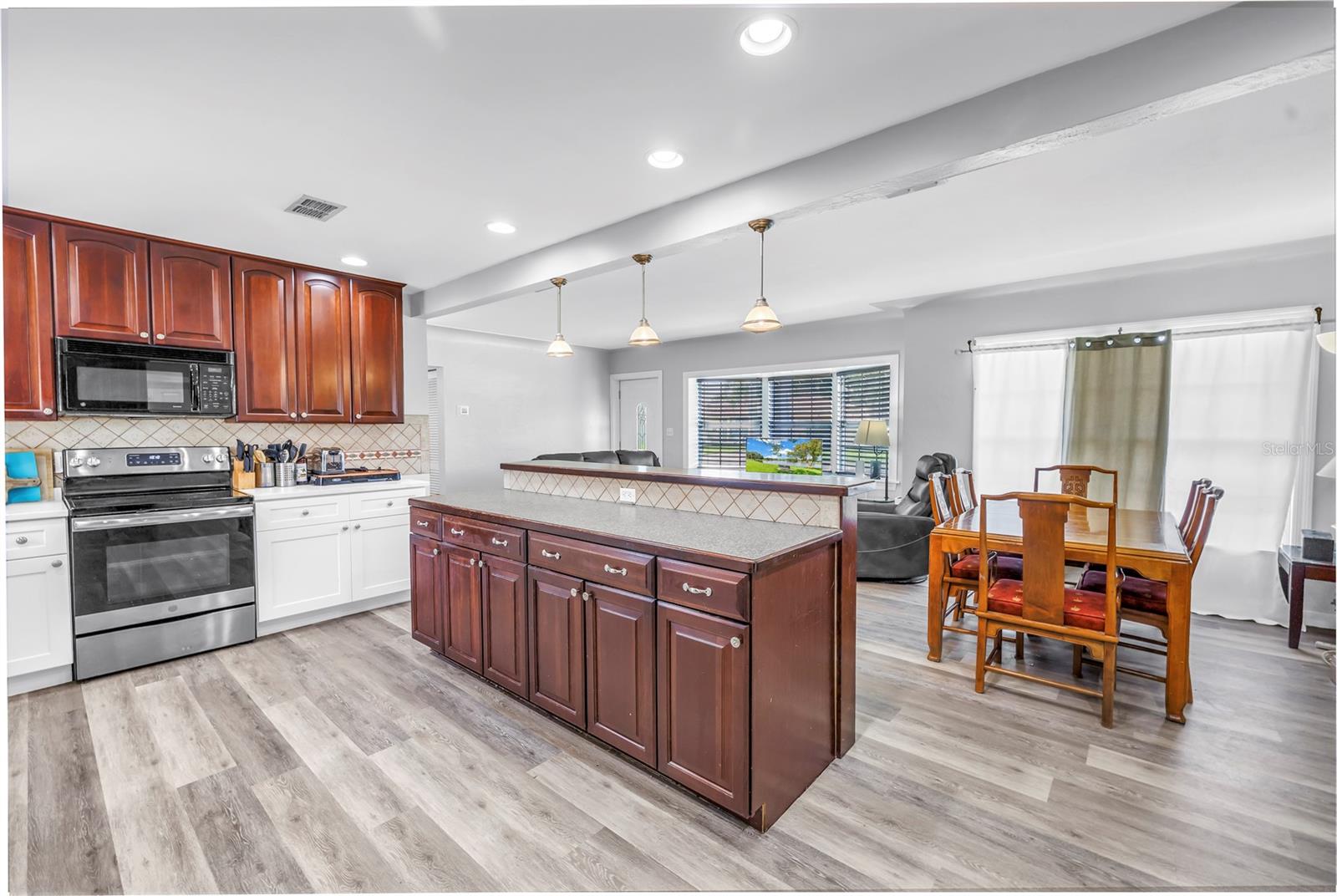 Kitchen open to living and dining rooms