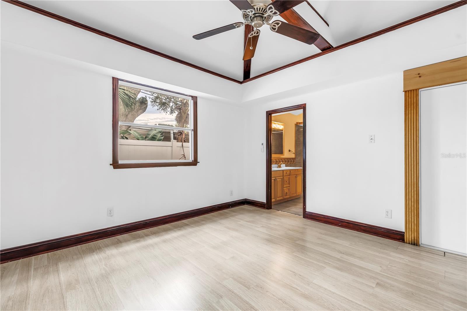 Vaulted Ceiling. Exit door to rear patio area.