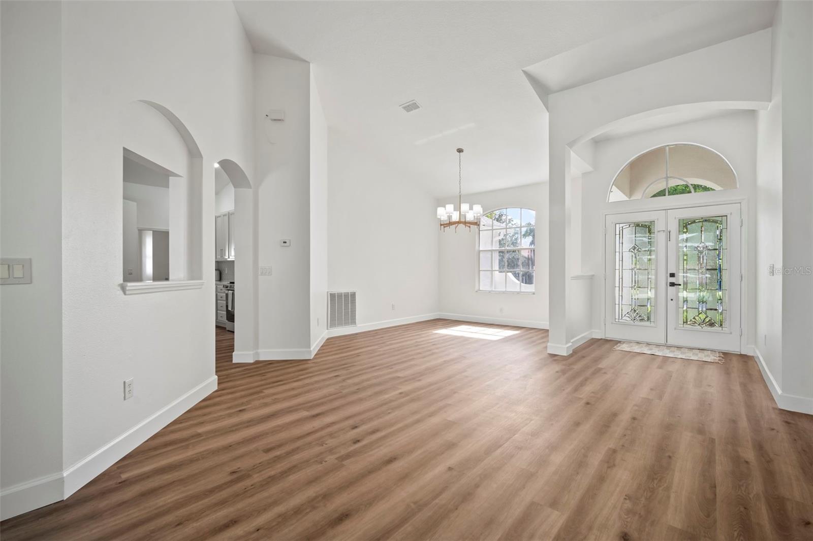 Formal Entry - 100% vinyl plank flooring throughout