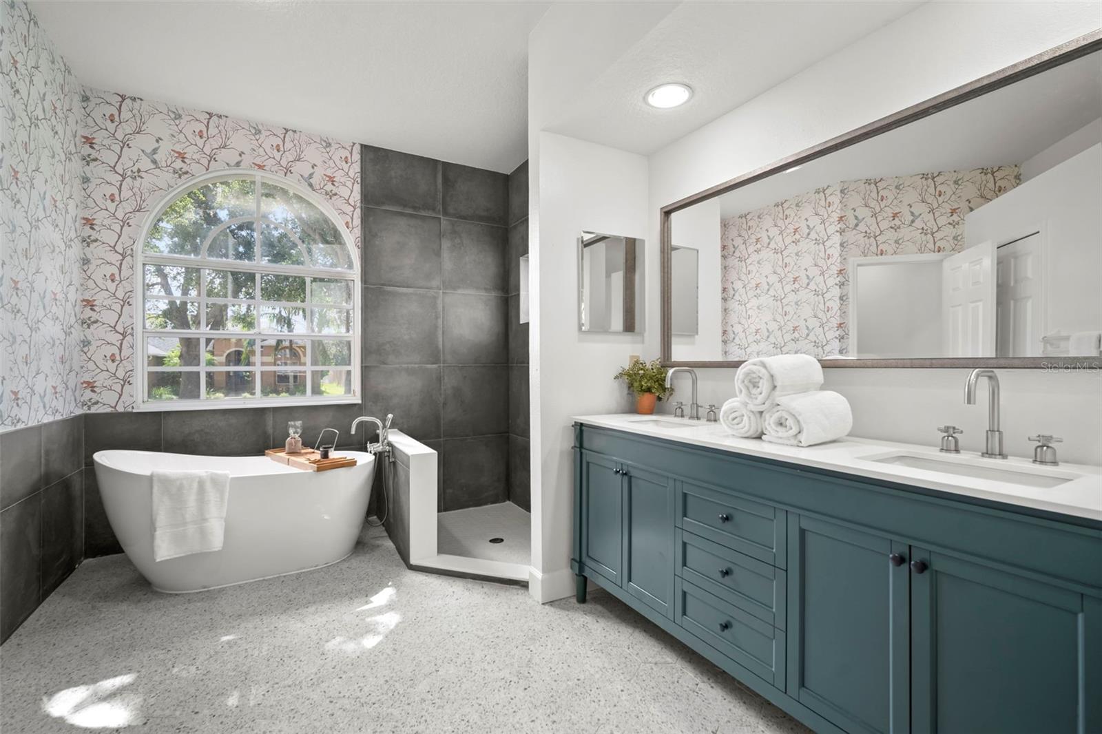 Primary Bathroom - designer tile flooring
