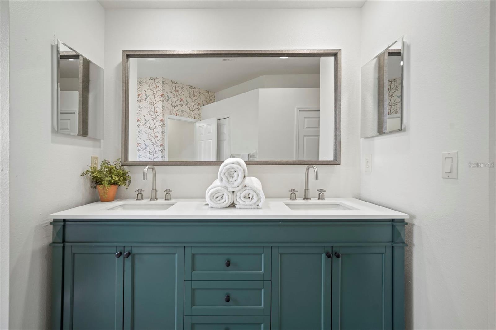 New vanity, mirrors, faucets & sinks
