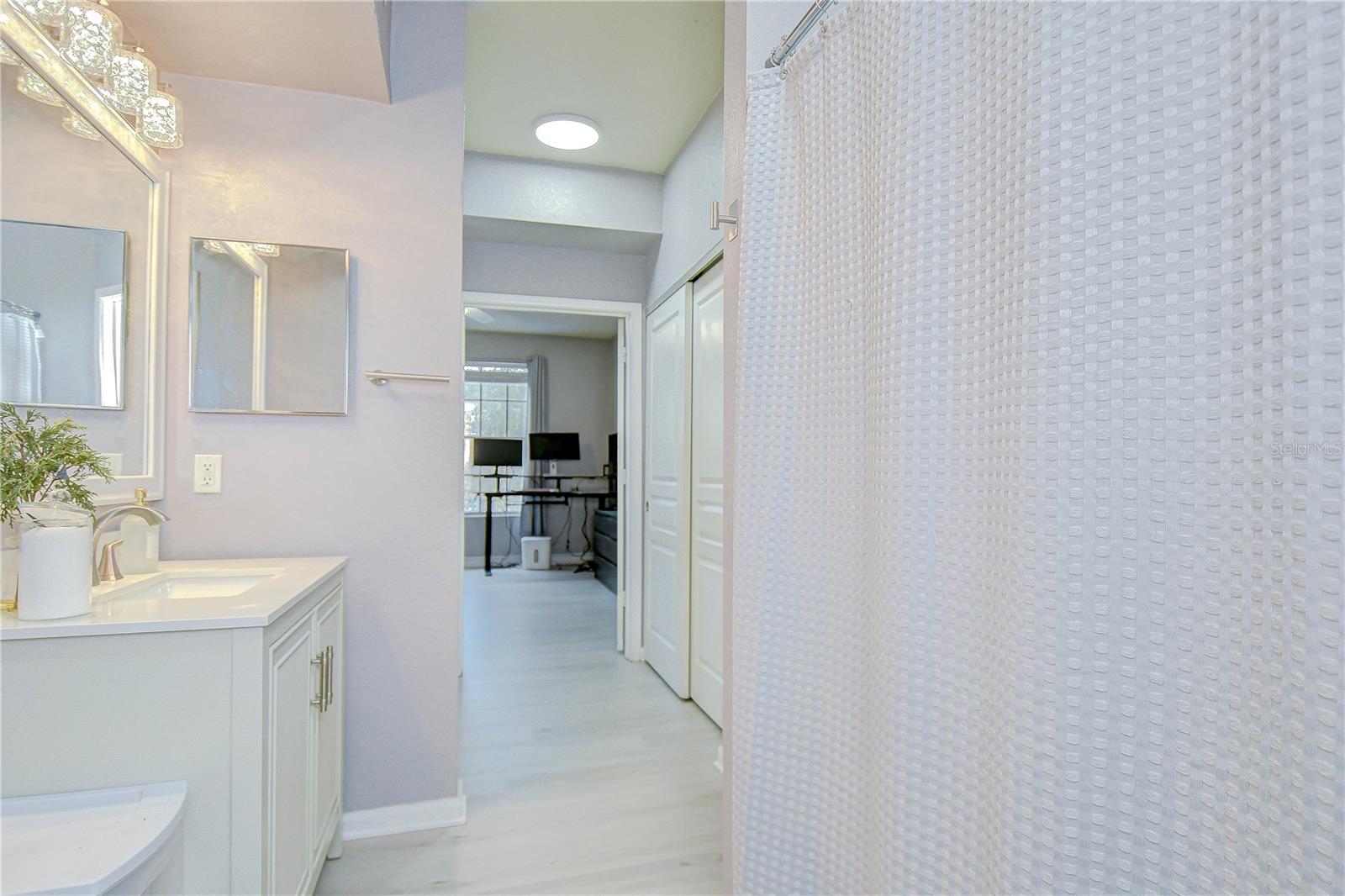 Partial view of second bathroom.