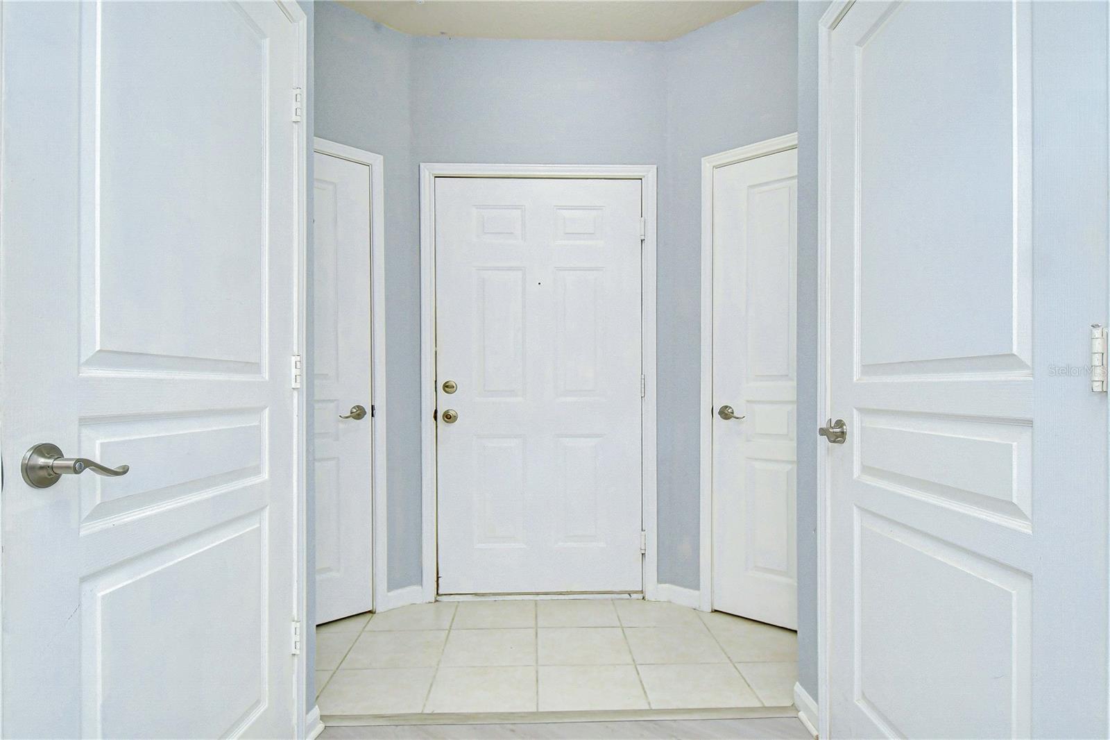 Front door and two closets.