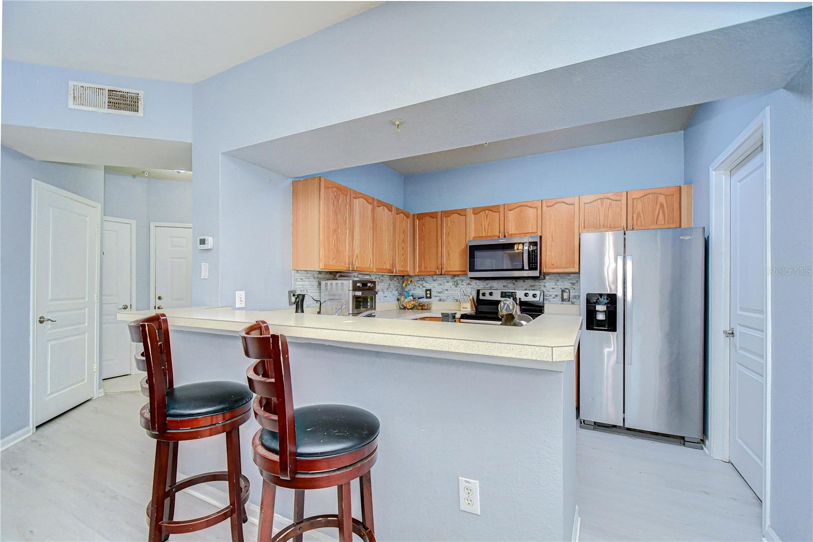 Countertop area leading into the kitchen.