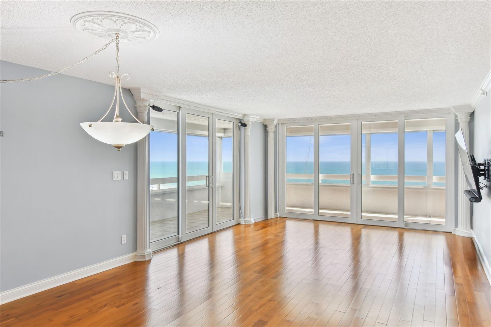 Natural light pours in from the beachfront