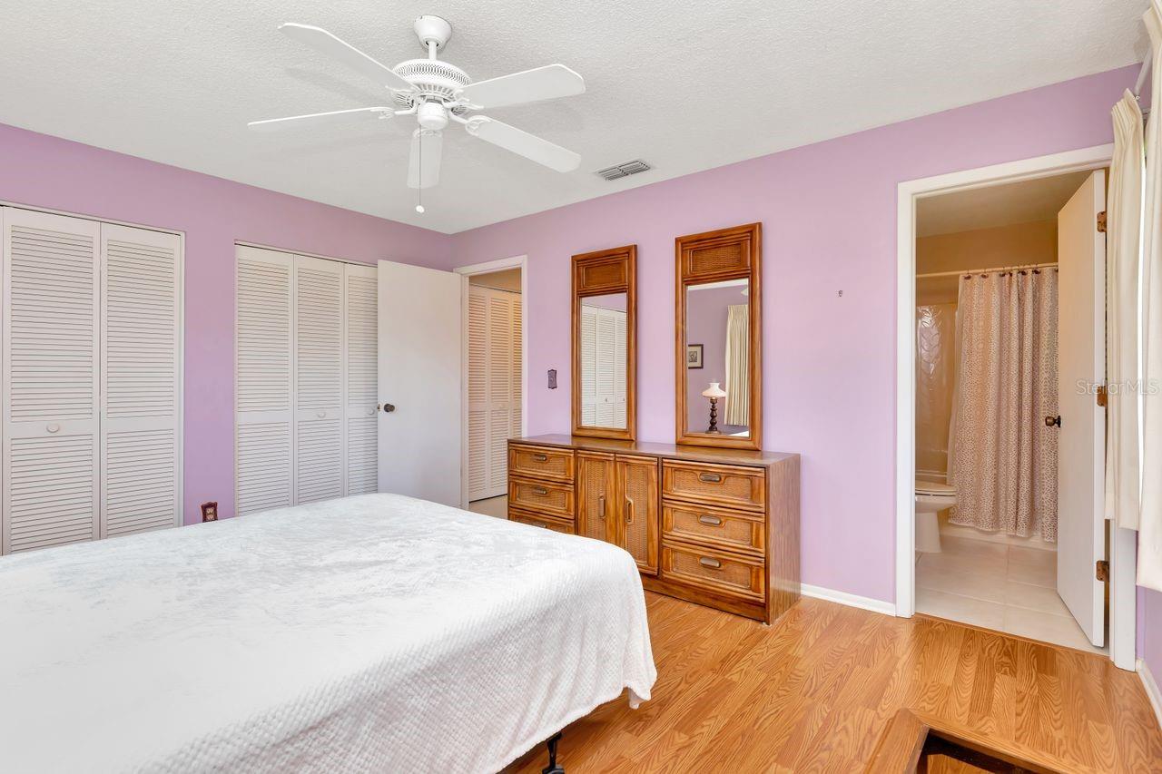 The primary bedroom is spacious with ample closet space.