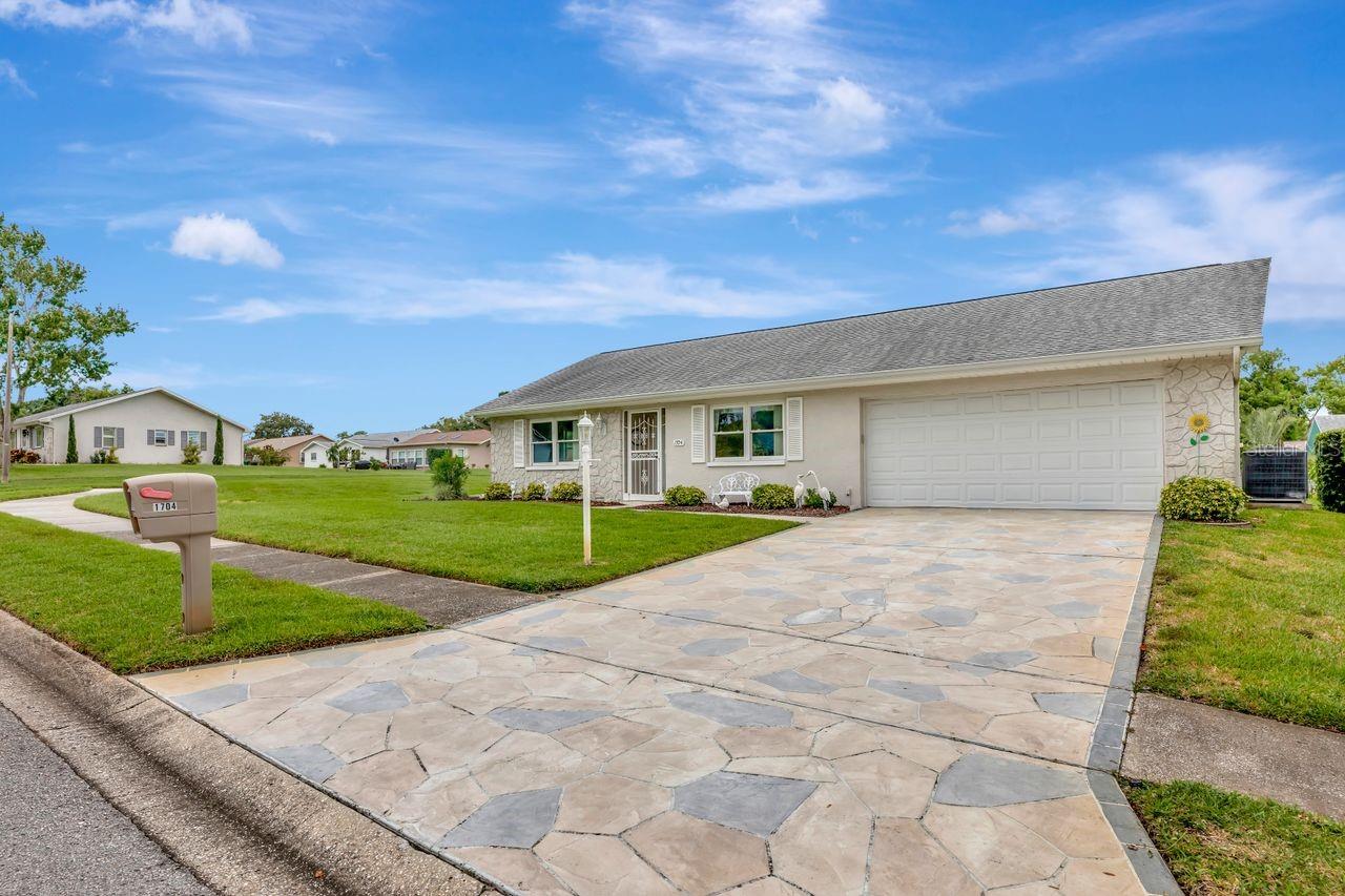 Beautiful pavered stone driveway.