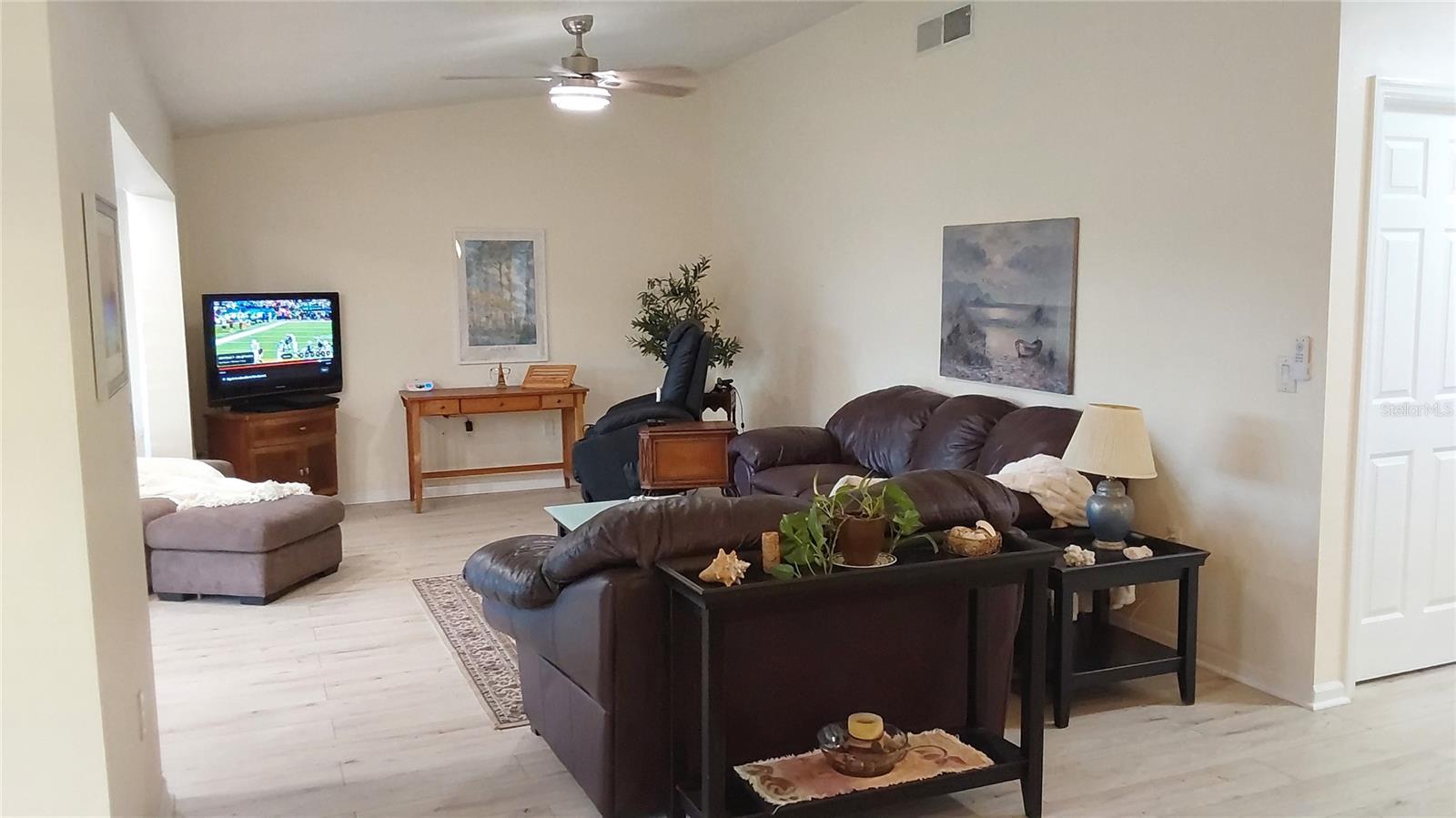 Living room with vaulted ceiling
