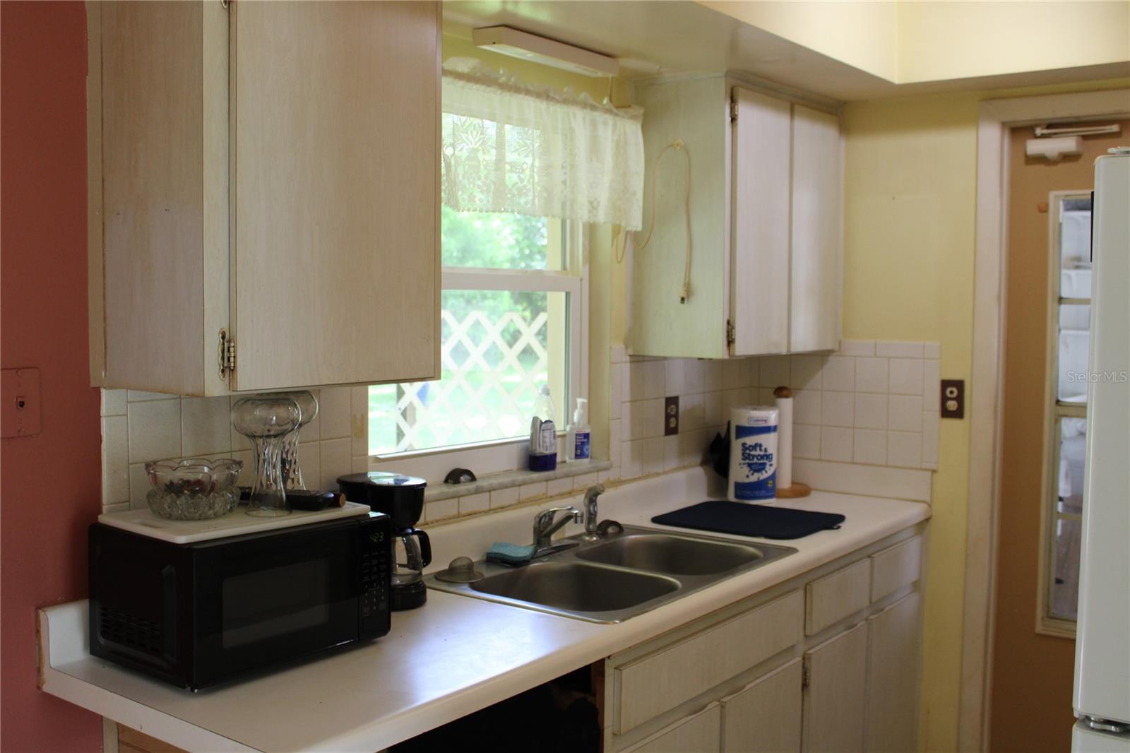 Kitchen is right off patio, great for cookouts