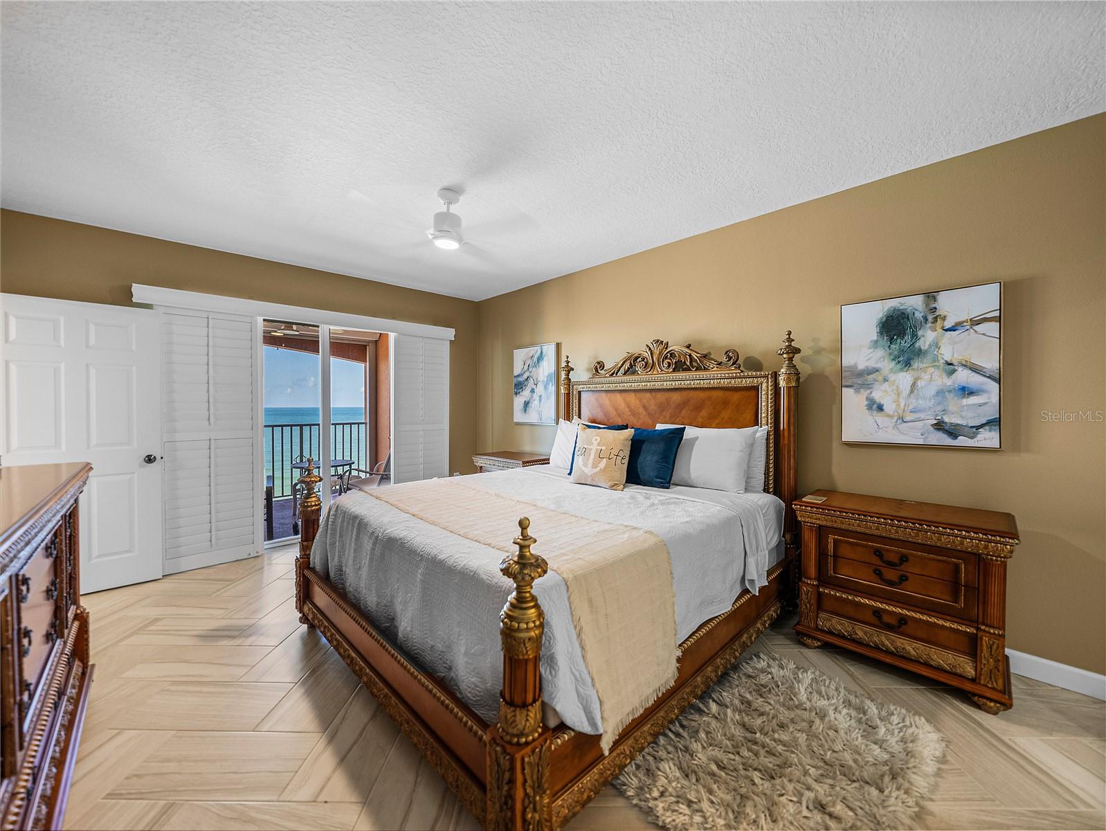 Primary suite with Gulf views and access to the balcony