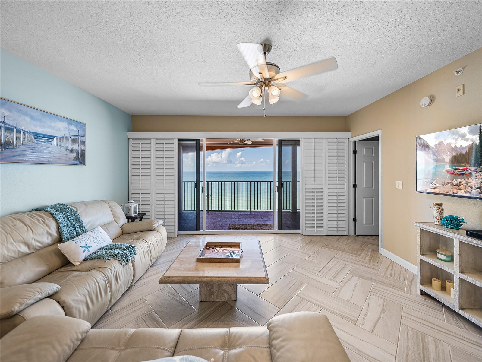 Large gathering space to take in the sights and sounds of the ocean or get cozy with a movie