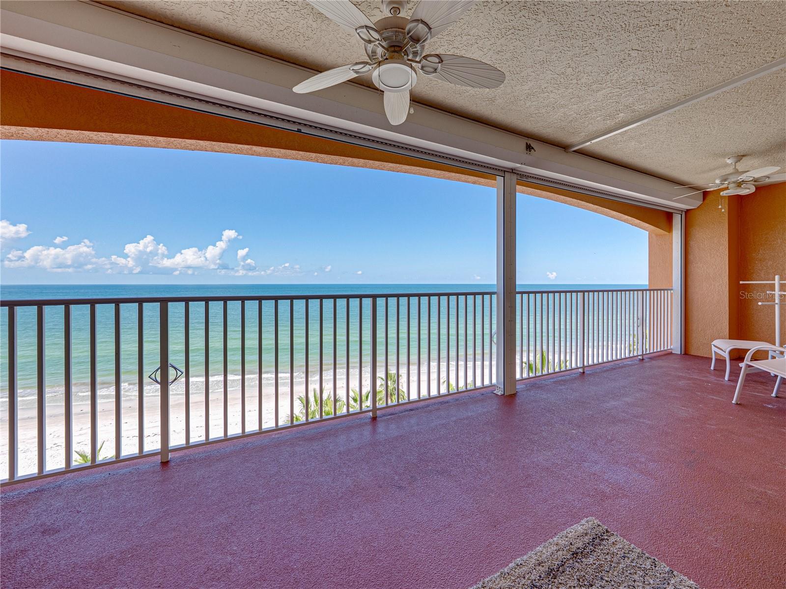Balcony large enough for loungers and table for dining al fresco