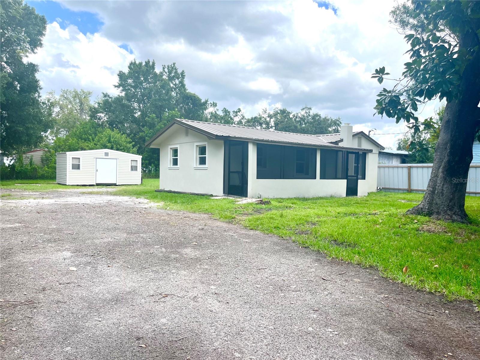 Side view of the house and shed