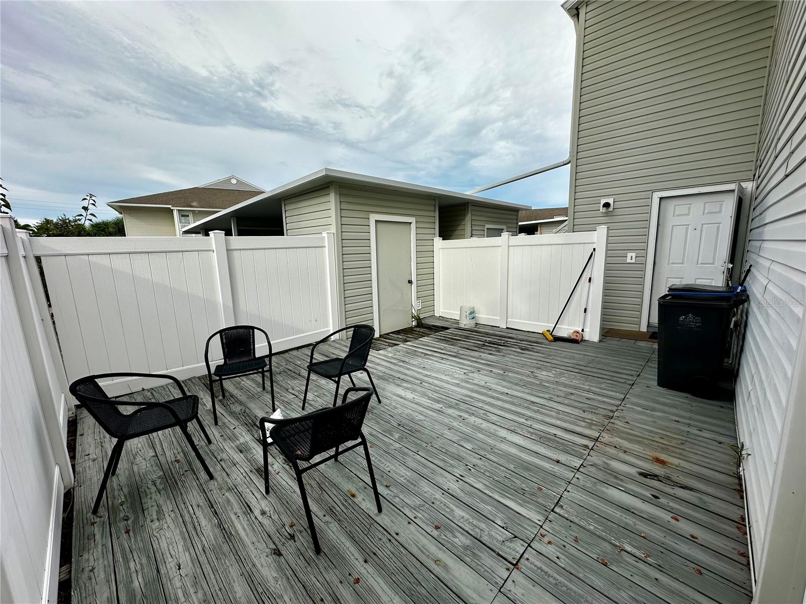Courtyard Patio, Storage Unit, Front Door