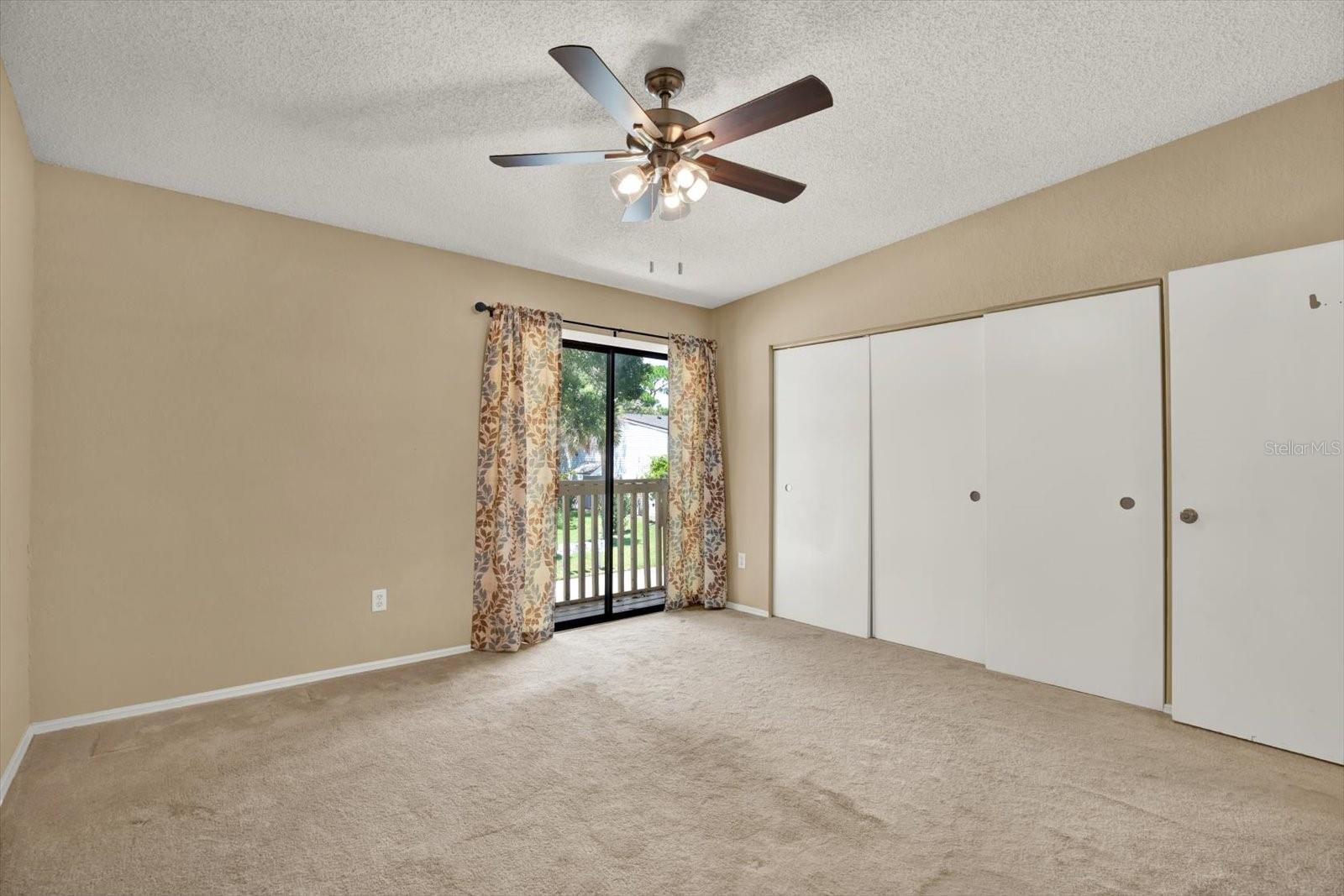 Primary Bedroom with private balcony