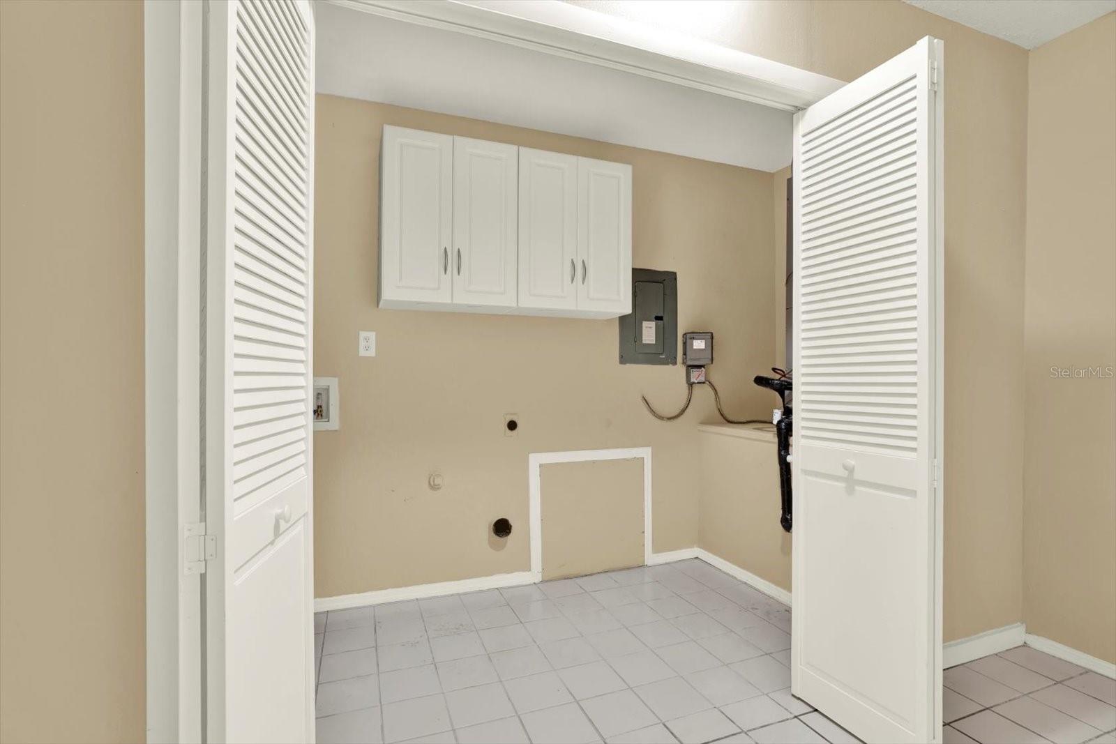 First level (from garage entrace) large room with laundry closet (washer and dryer hookups)