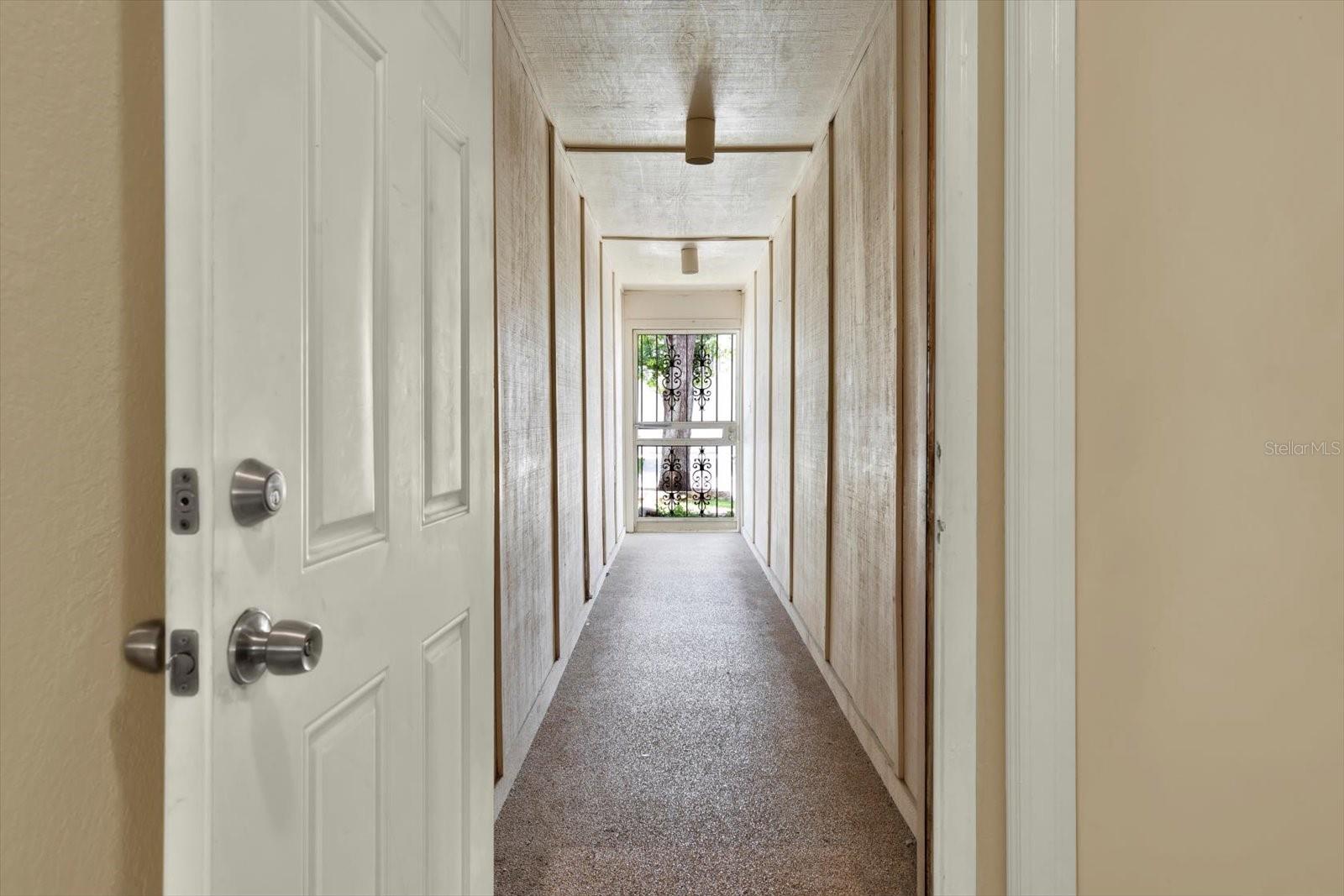 Covered hallway entrance.