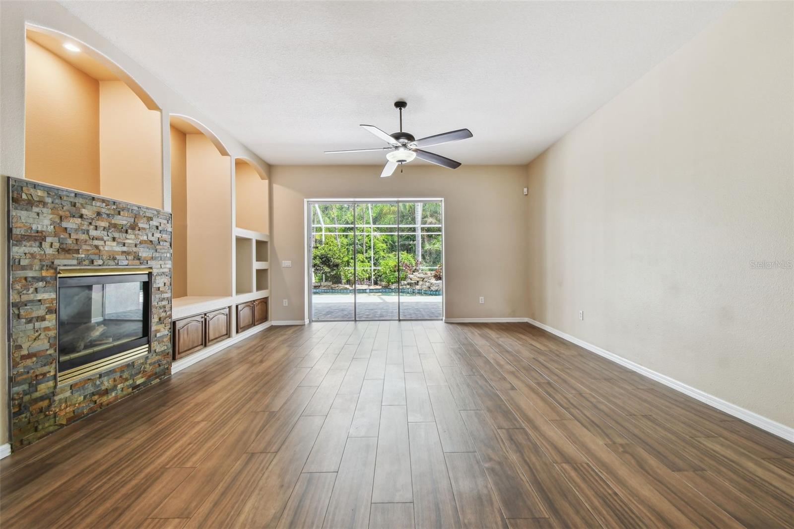 Family Room with Tripple, Pocketing Glass Doors to Lanai