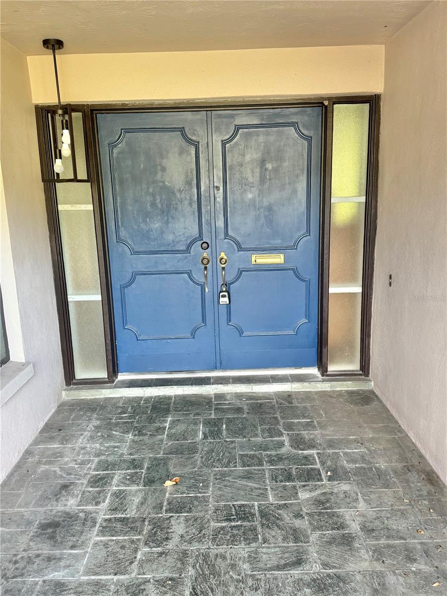 Covered and gated entry porch