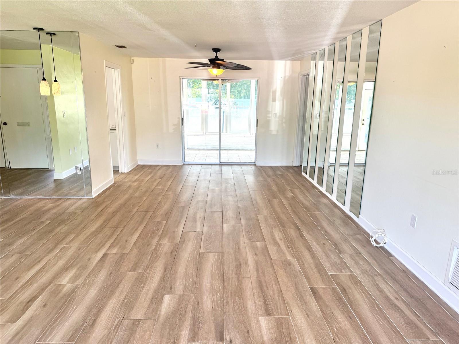 Dining area leads to the enclosed lanai.