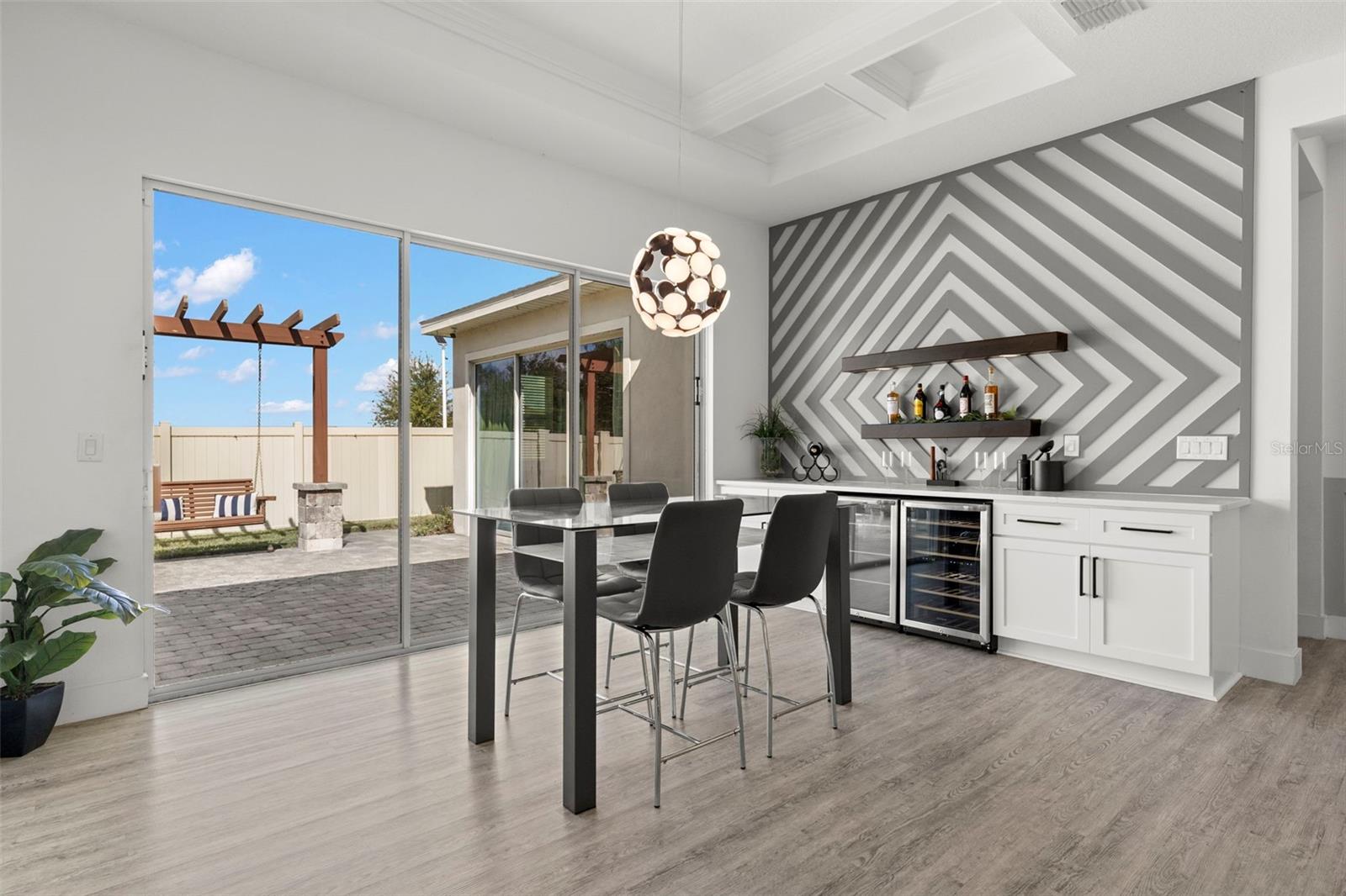 Dining area with additional counter space and two mini fridges