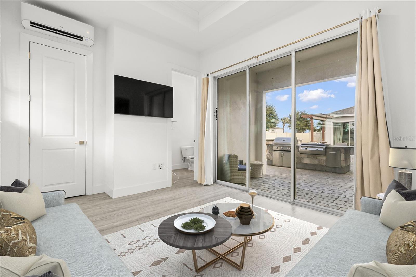 *vitually stagged - A separate guest suite features tray ceilings, a full bathroom, and a private covered lanai—ideal for visitors or multigenerational living.