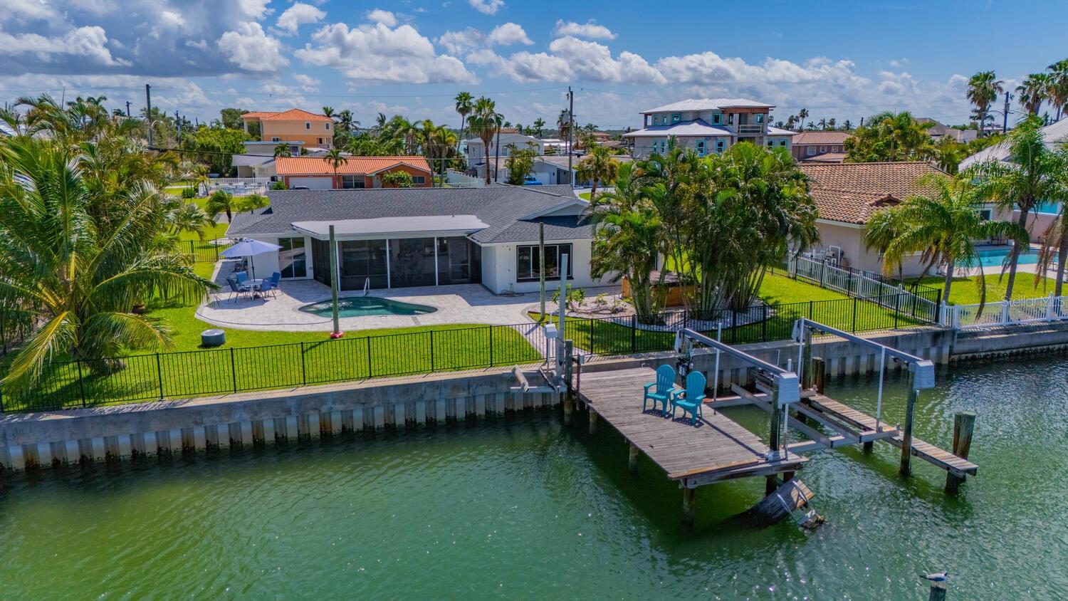 105' of Waterfront w/ dock boat and jet skit lift with large vessel mooring
