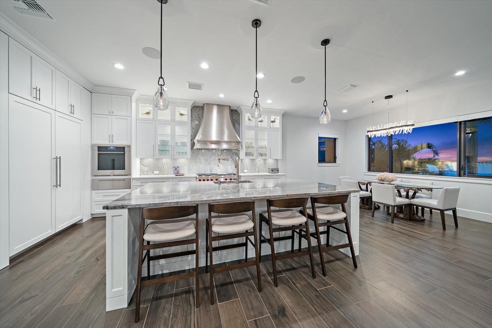 Chefs will appreciate culinary experiences in the exquisite kitchen with top of the line appliances, abundant storage and counter prep space.