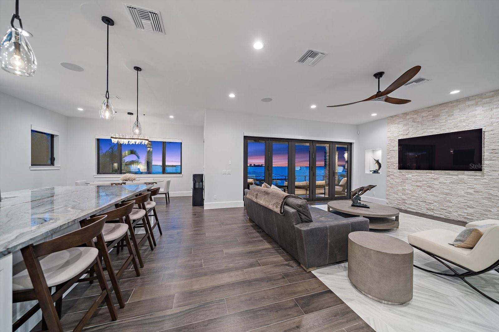 Feature wall of attractive stonework in great room.