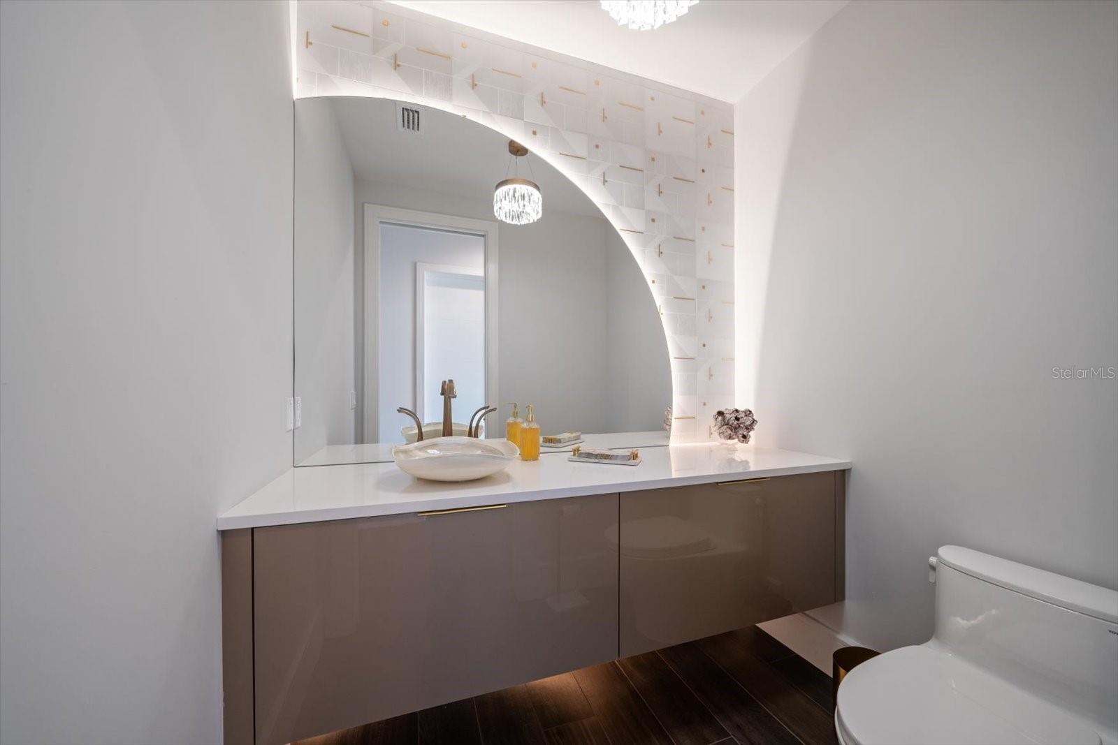 Guest bath with creative finishes that are rare! Located near great room area.