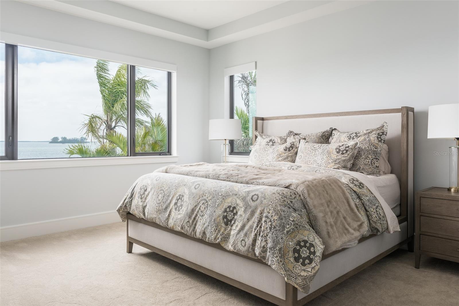 Primary suite with panoramic views and access to expansive terrace. Enjoy sunrise to sunset views!