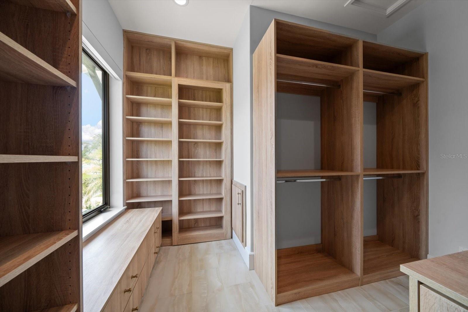 Primary bedroom closet with natural light!