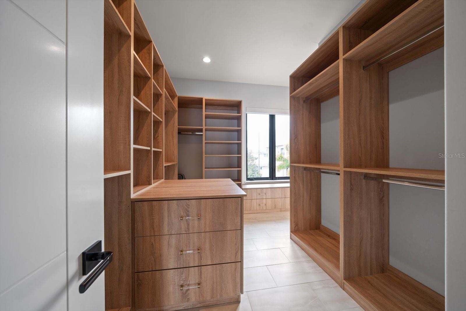 Primary bedroom closet offers storage galore!